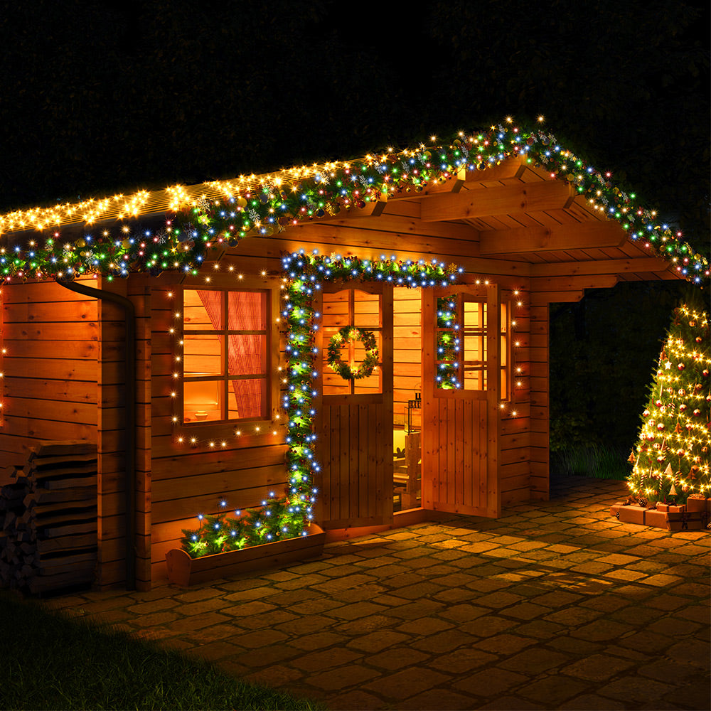 Catena di luci Natale 200 LED transparente bianco caldo 20m